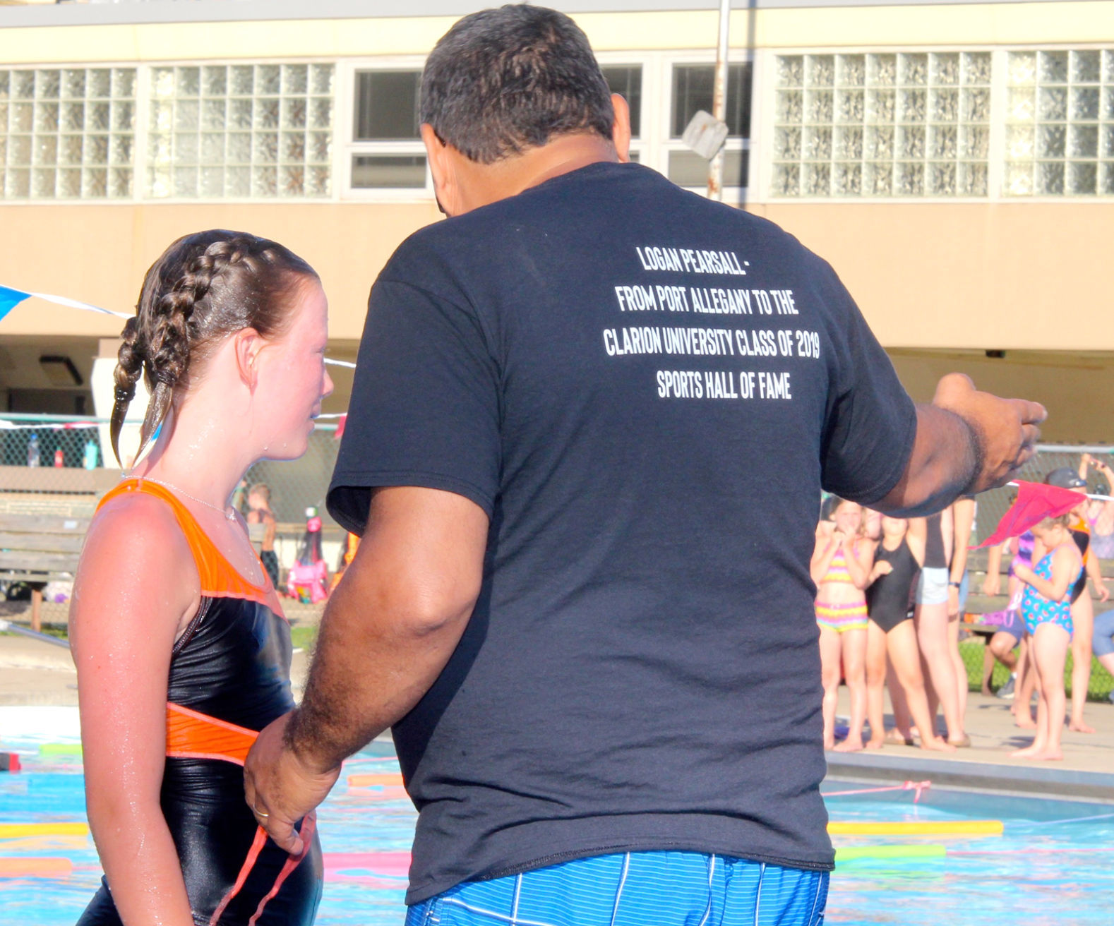 Coach Edgell wears shirt supporting former student athlete